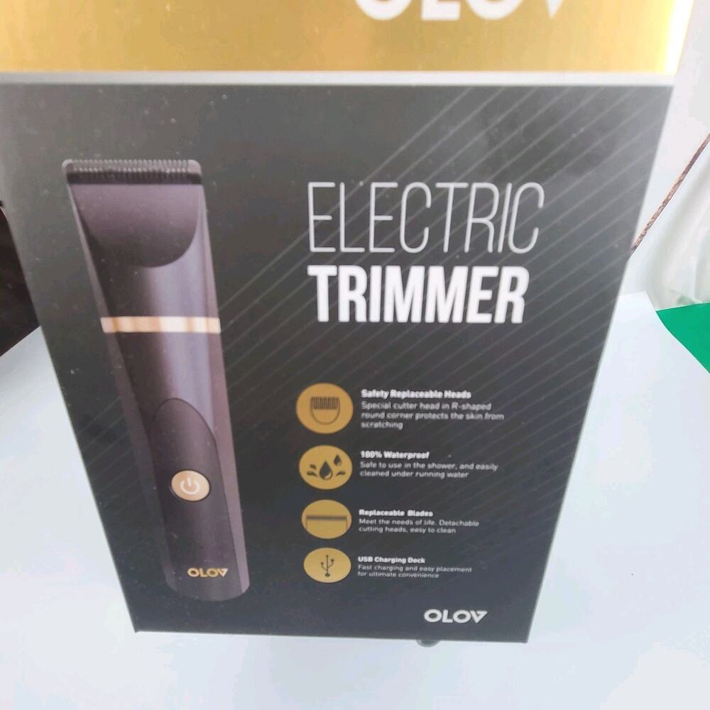 OLOV Electric Body Hair Trimmer New YP-7032 Waterproof. Wet Or Dry Box is‎ open